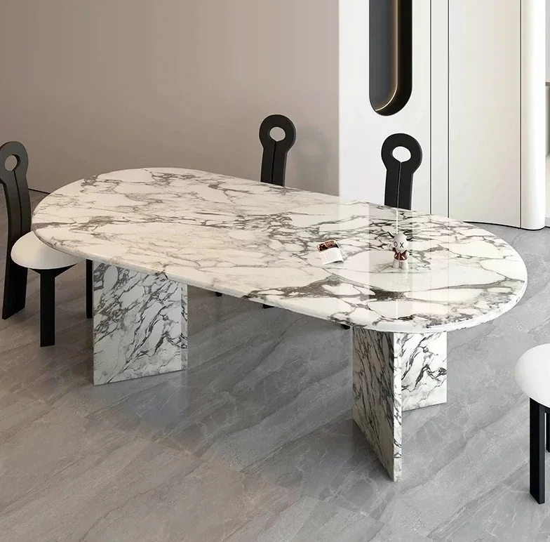 Full marble dining table with bold grey veining
