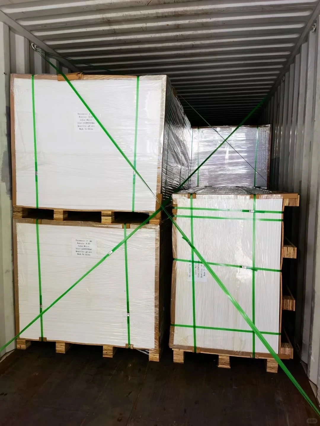 Loading is the final factory checkpoint: packages should be secured to reduce shifting and impact in transit.