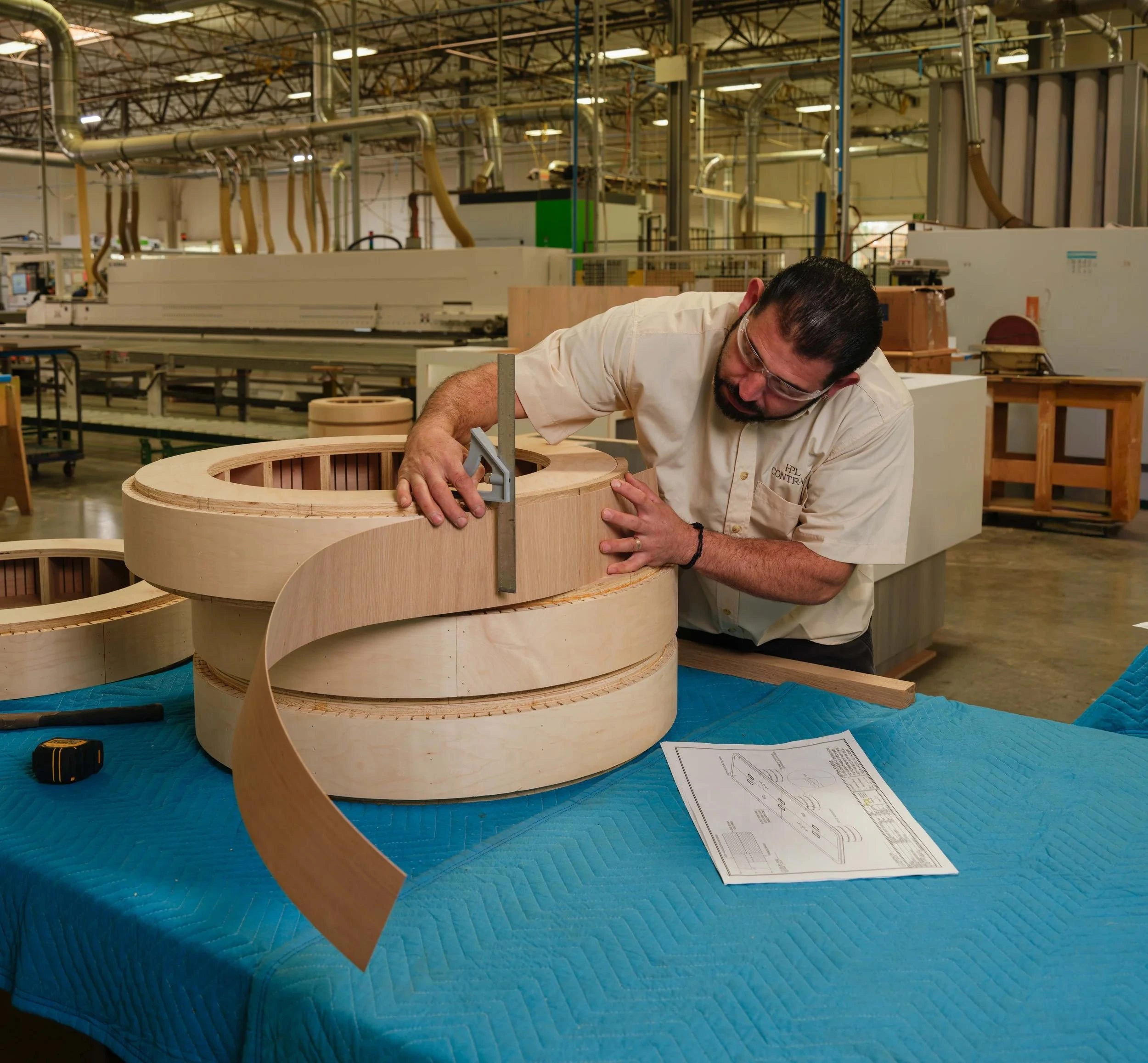 Curved furniture form receiving veneer