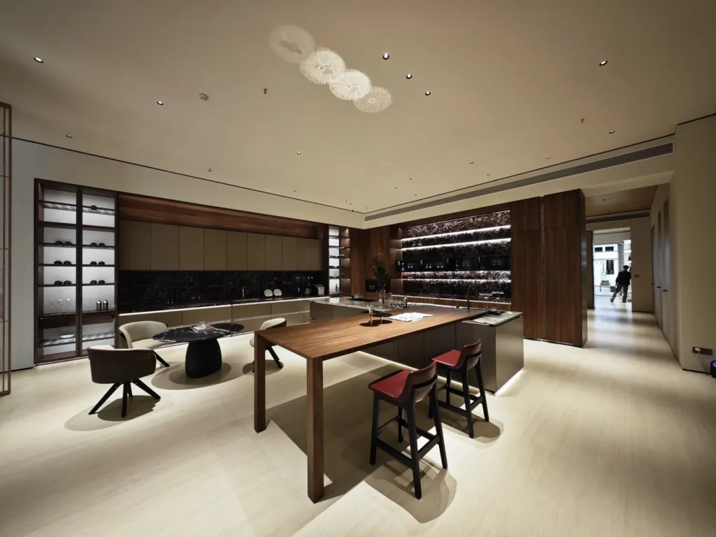 Dining tables, bar seating and display millwork in a partner furniture showroom
