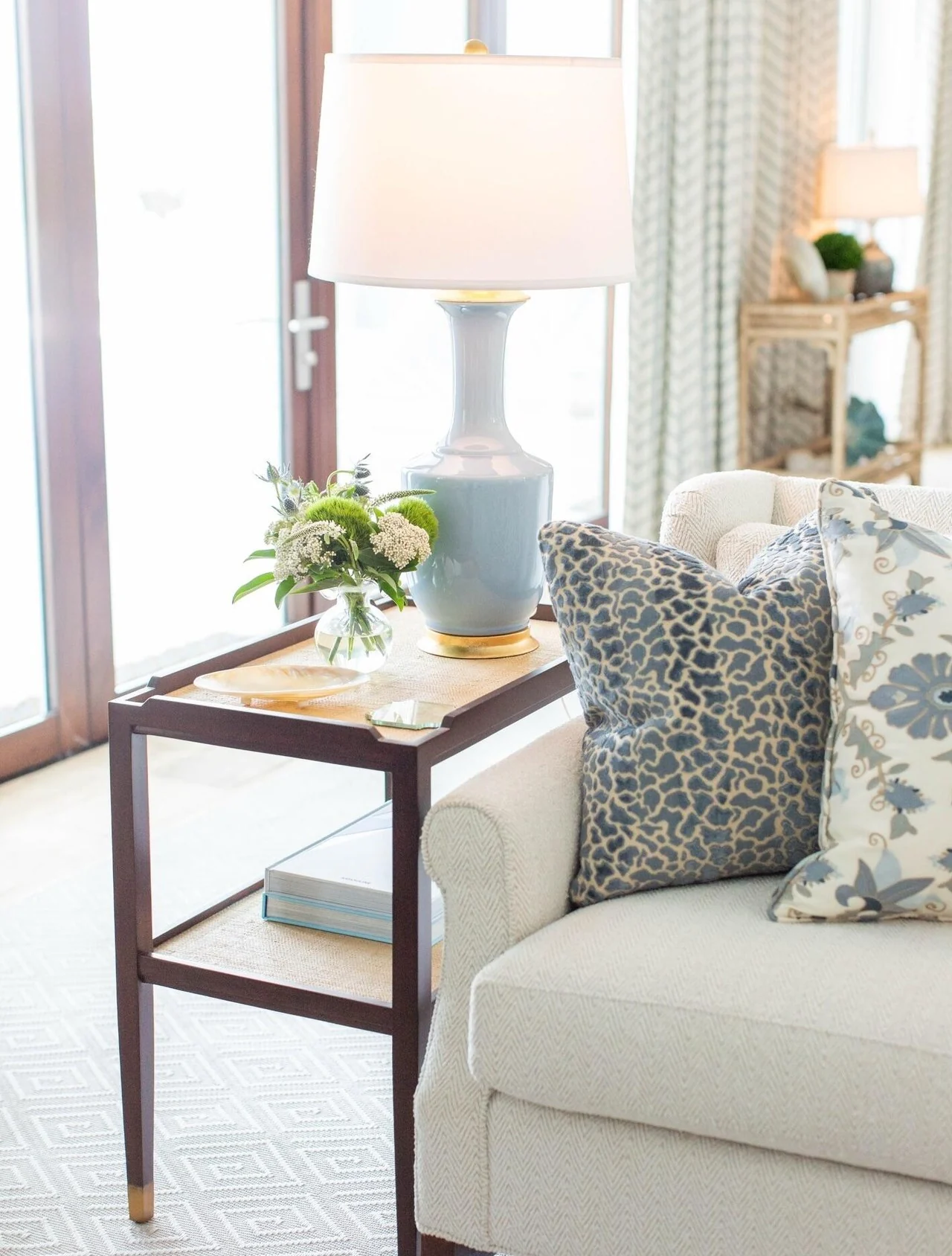Side table and lamp in a coastal-style living room