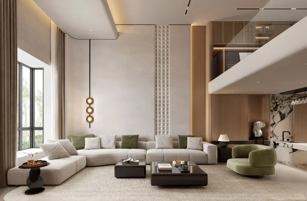 Italian minimalist living room with neutral modular sofa, green accent chair, dark coffee tables and architectural lighting