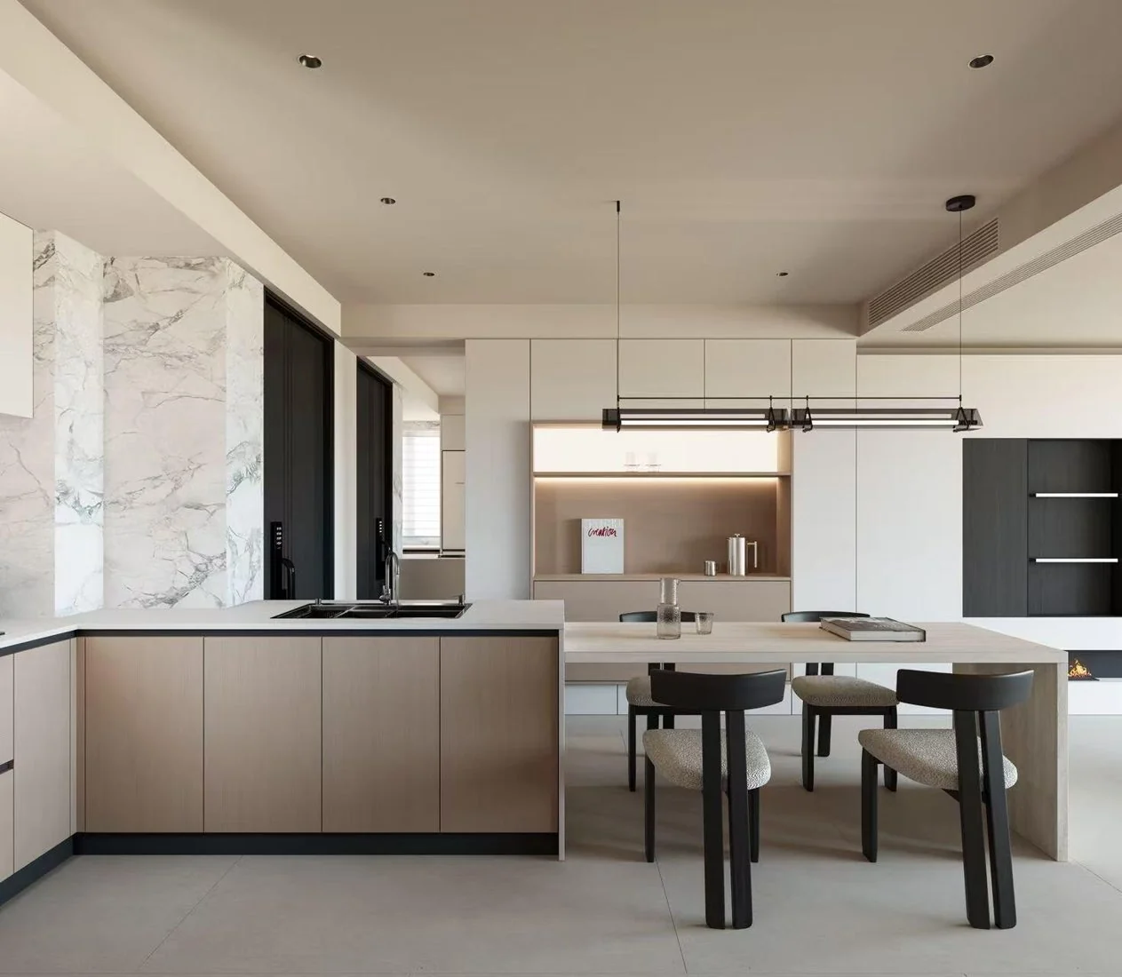 Integrated kitchen fronts let furniture and architecture read together.