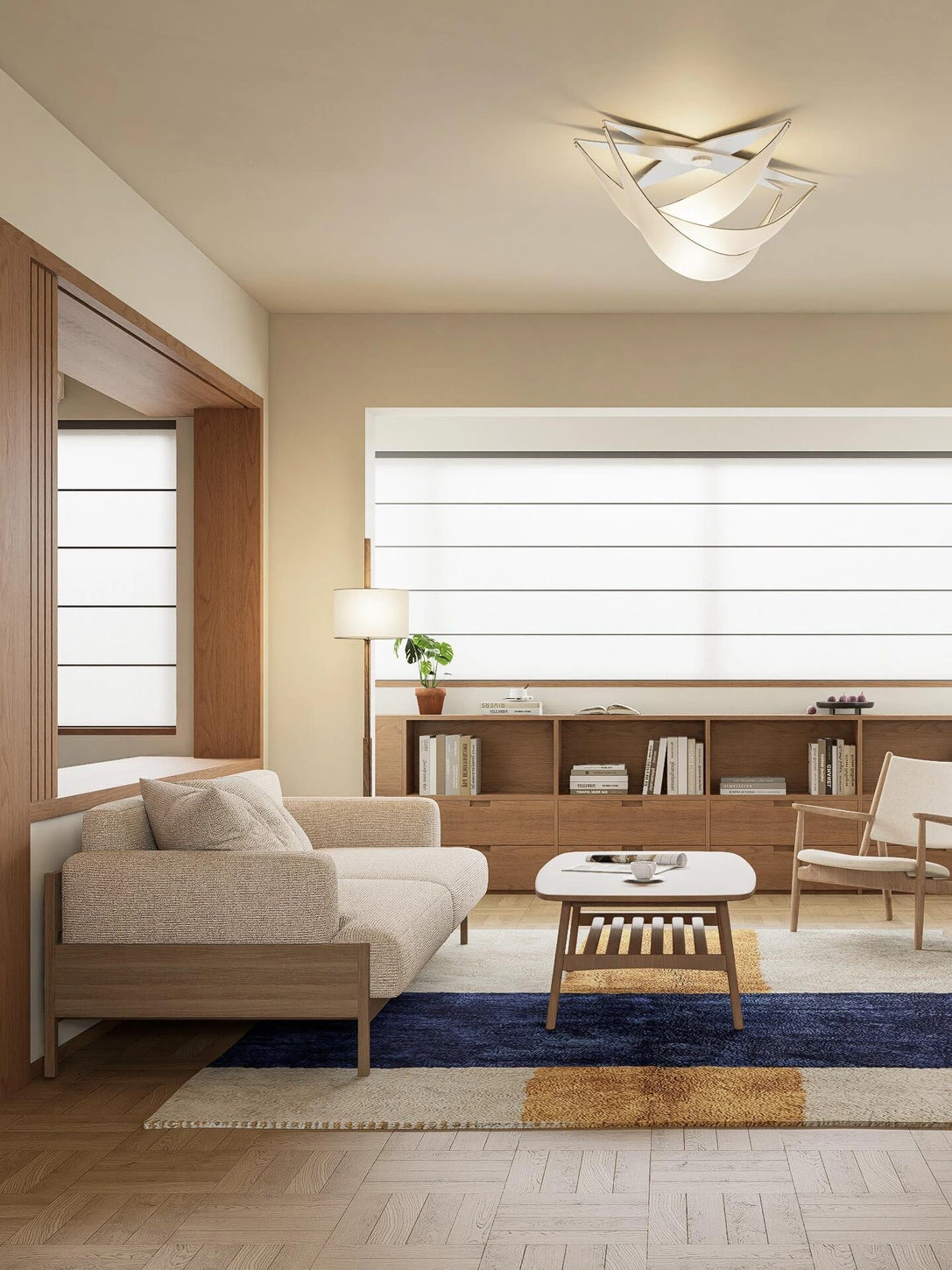 Japandi lounge with sofa, light wood coffee table and soft blue and ochre rug