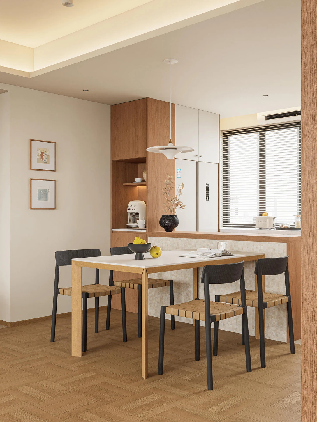 Warm wood dining table and woven dining chairs in Japandi apartment